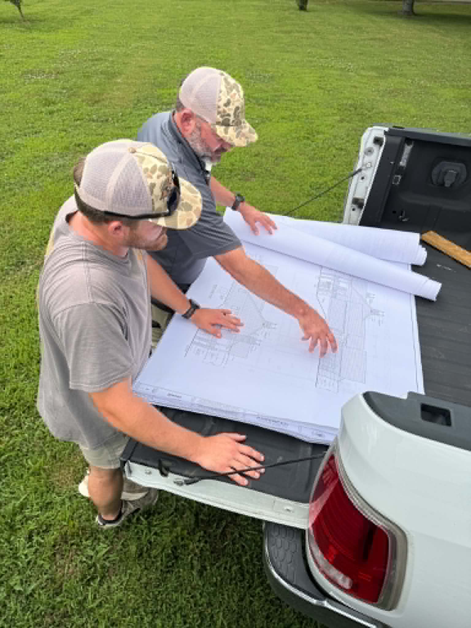 Scott Chaney Construction team reviewing project blueprints