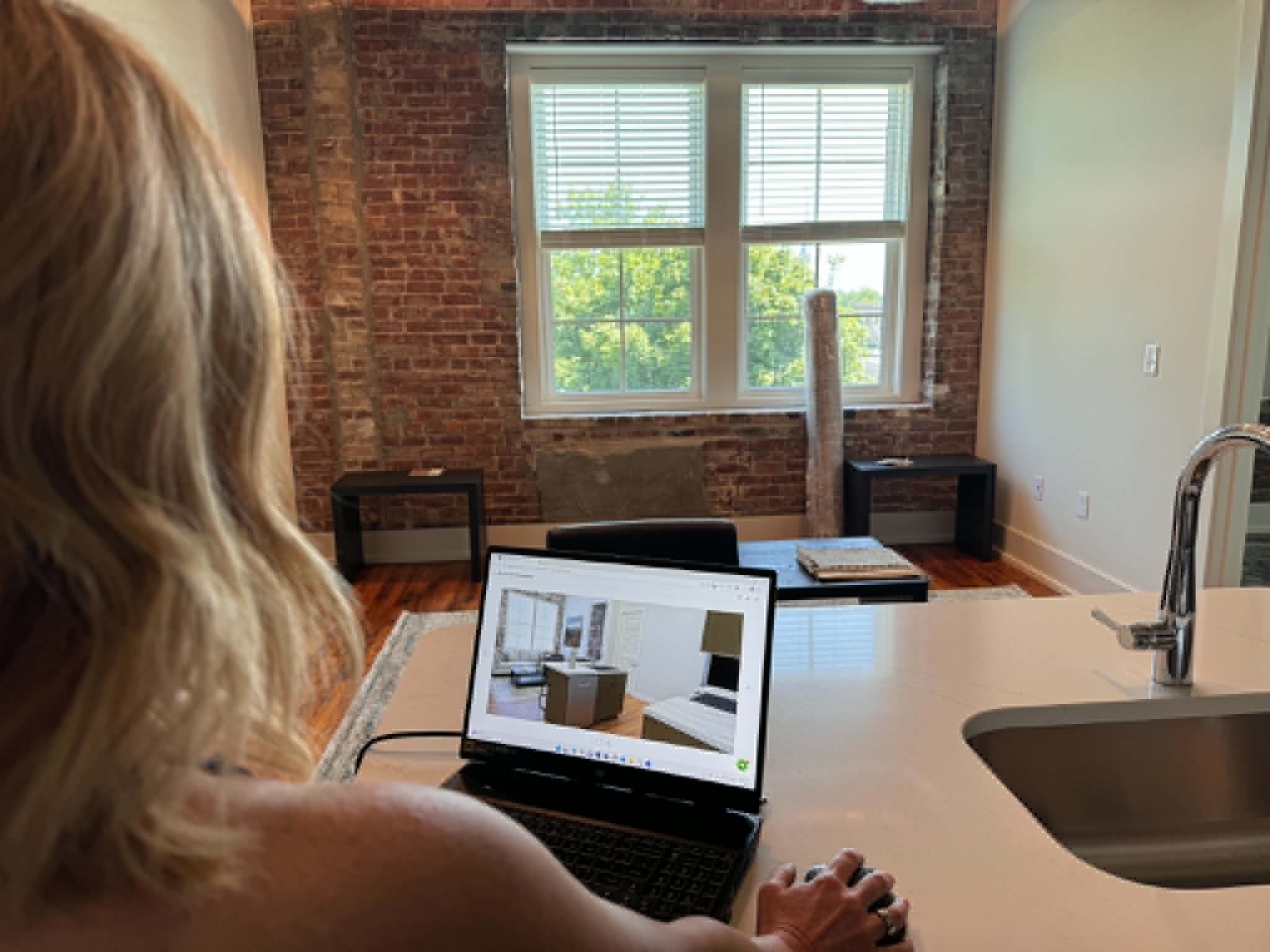 Reviewing renderings and floor plans during preconstruction planning